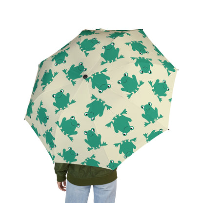 Umbrella with green frog pattern on a beige background
