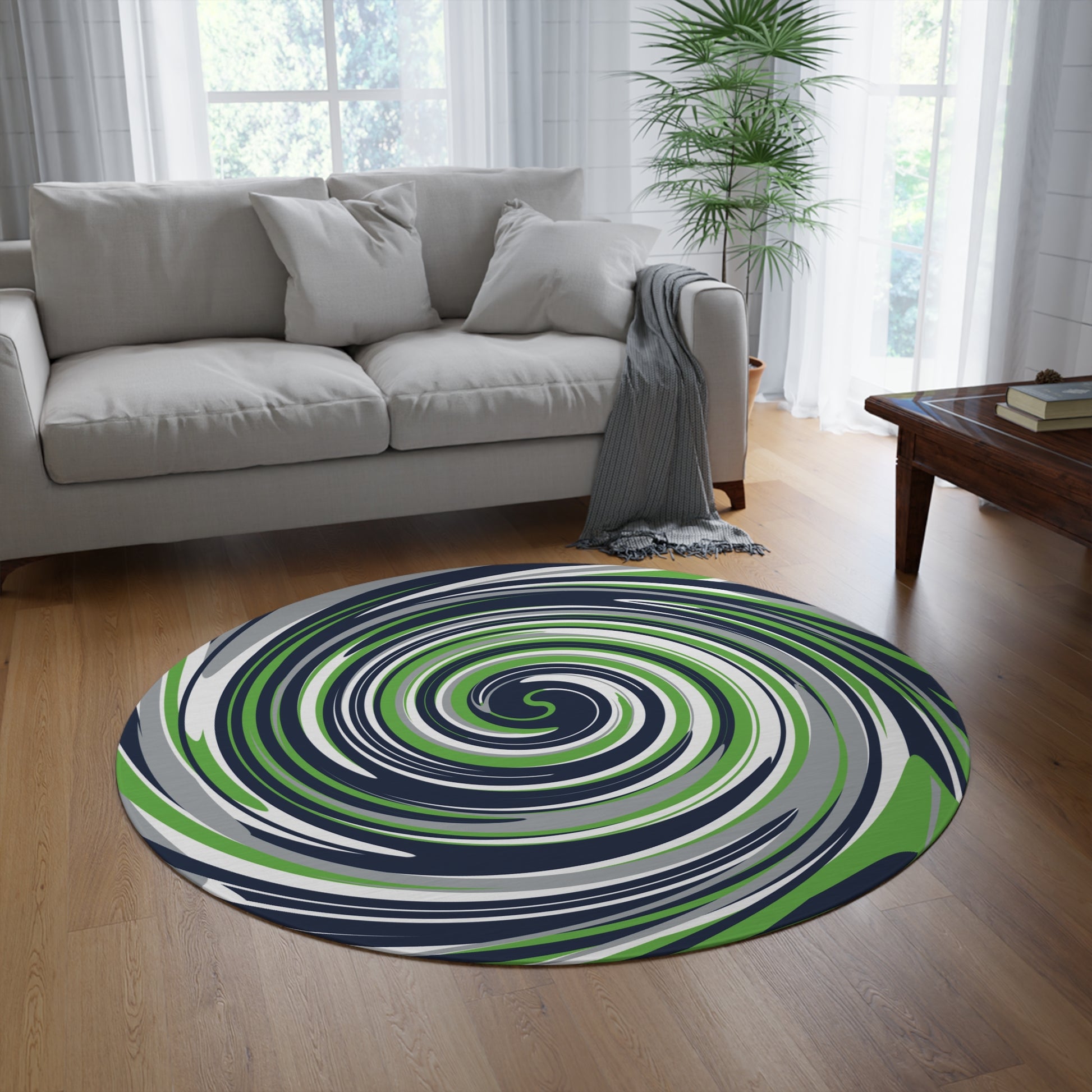 Round spiral patterned rug on a wooden floor in a living room.