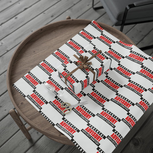Gift box on a table with 'ADVISORY' patterned paper