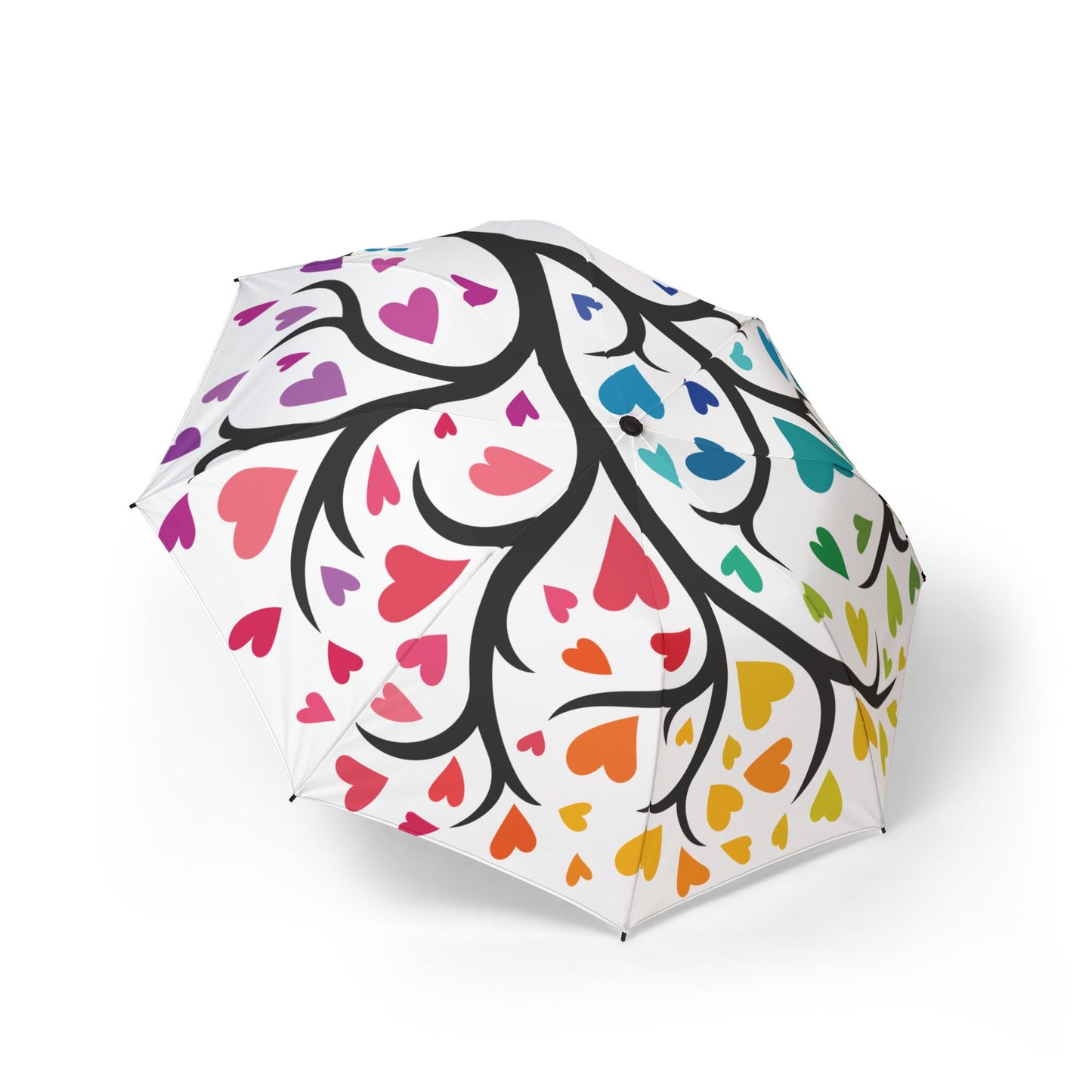 Colorful heart-patterned umbrella on a white background