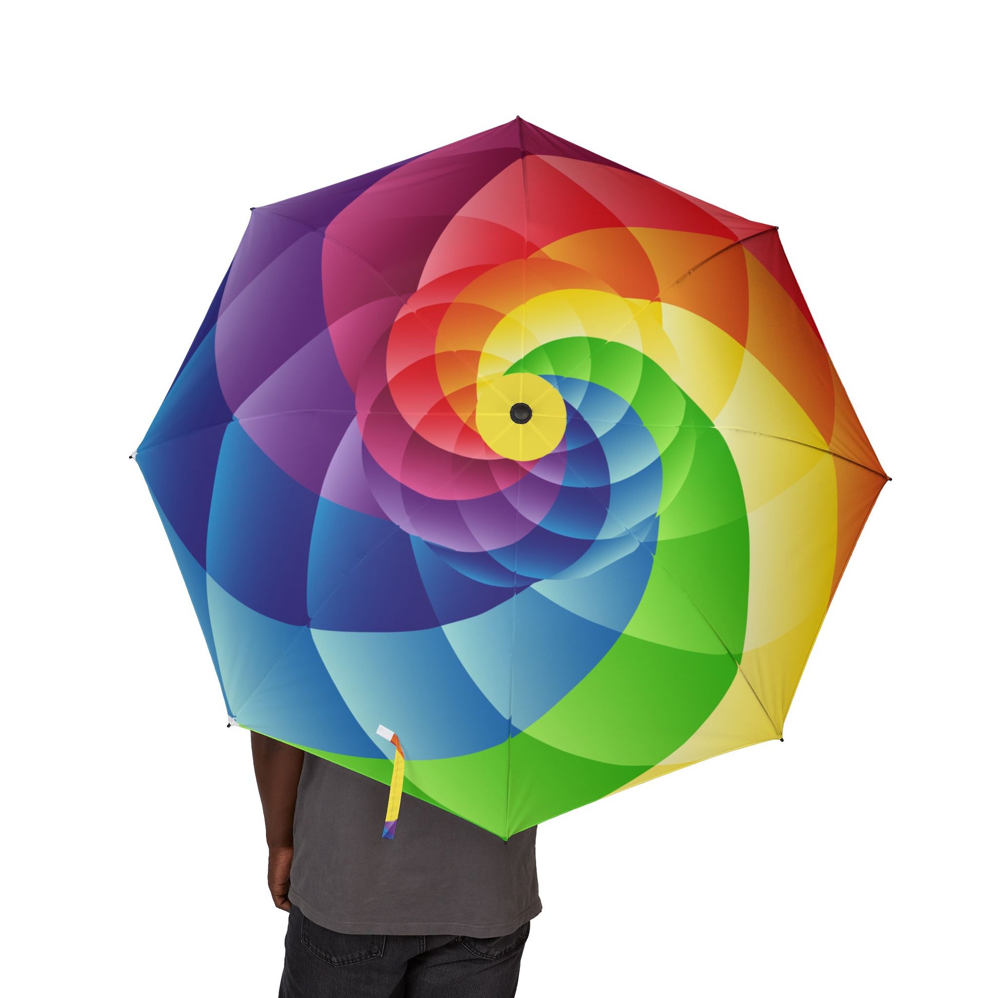 Colorful spiral-patterned umbrella held by a person on a white background