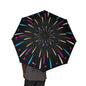 Black umbrella with colorful starburst pattern held by a person on a white background