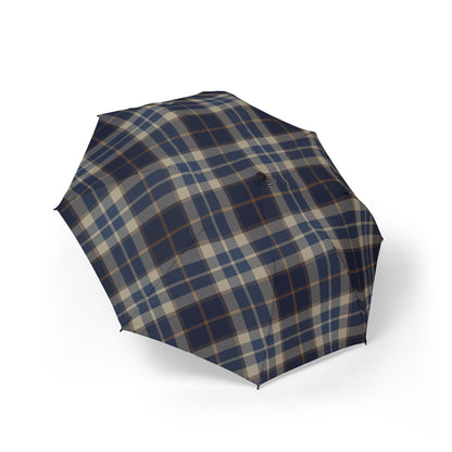 Plaid patterned umbrella on a white background