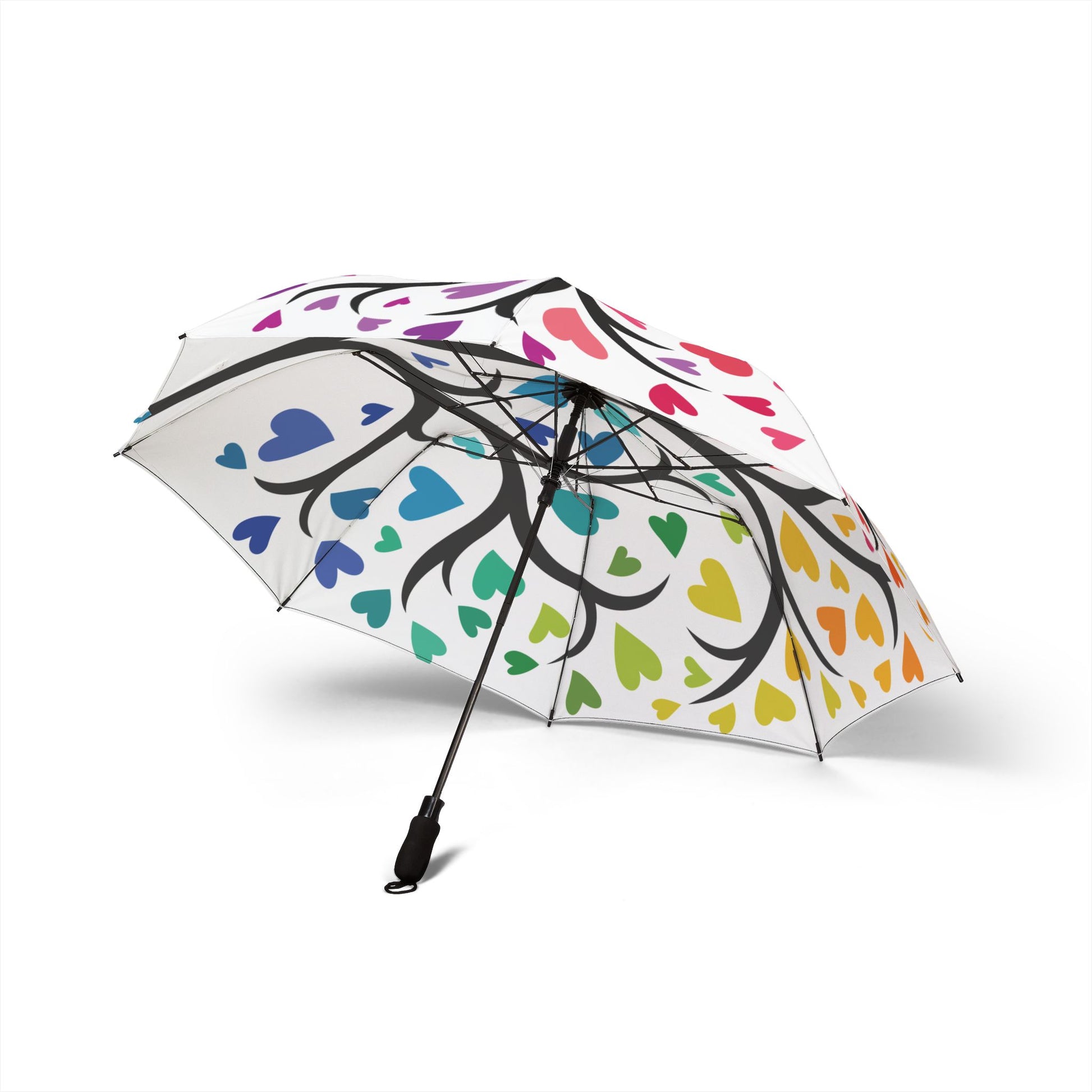 Colorful heart-patterned umbrella on a white background