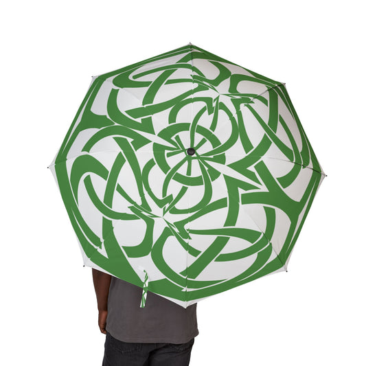Green and white patterned umbrella held by a person on a white background