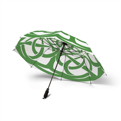 Green and white patterned umbrella on a white background