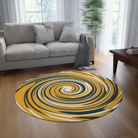 Round yellow and black spiral patterned rug in a living room with a gray sofa and wooden coffee table.