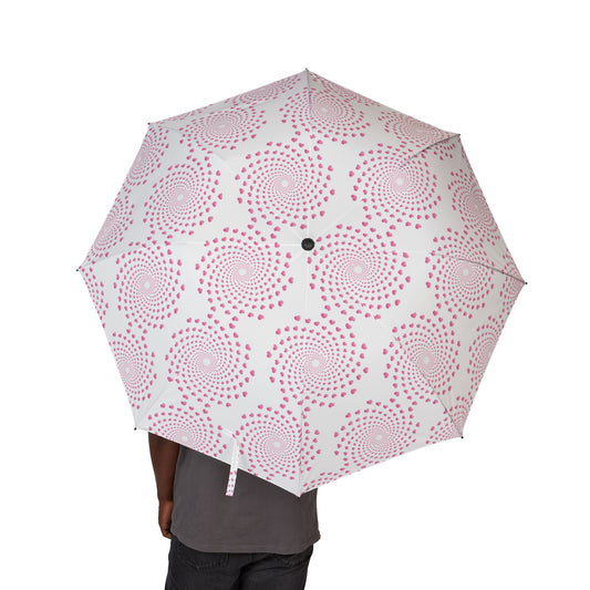 Umbrella with pink circular pattern on a white background