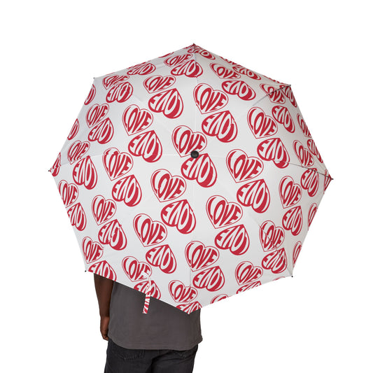 Umbrella with red heart and 'LOVE' pattern on white background