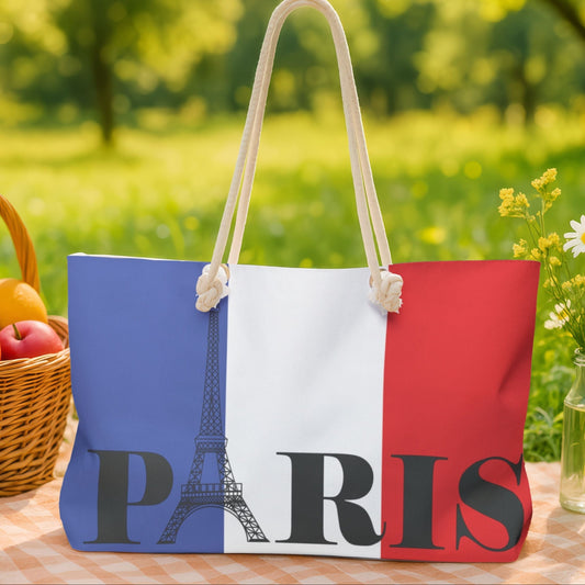 Tote bag with Paris design on a picnic blanket outdoors